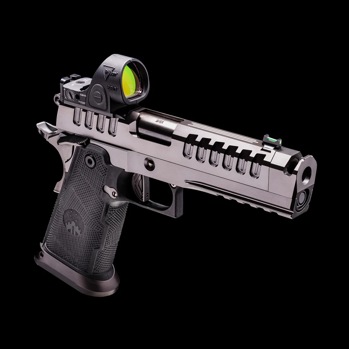 Watchtower Defense Apache double-stack 1911 in 9mm with a red dot optic