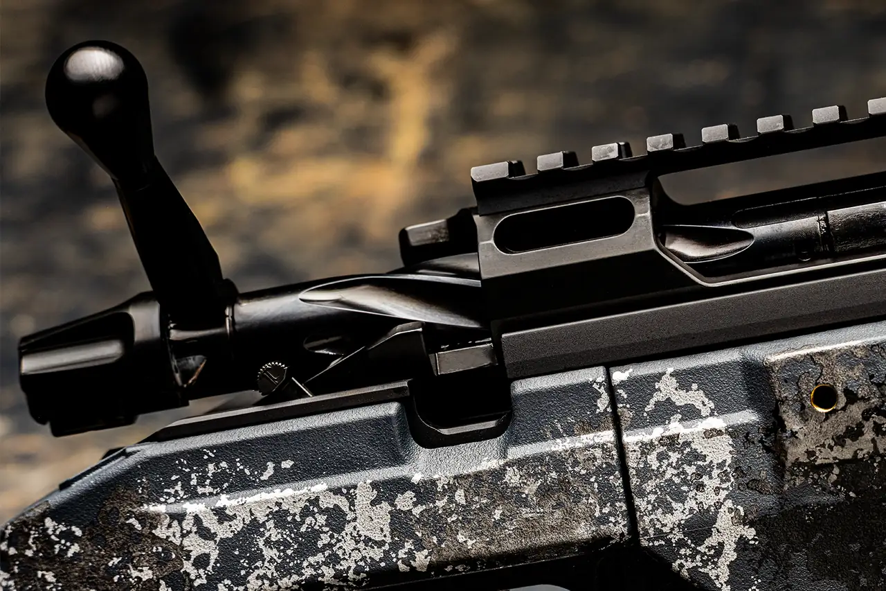 Watchtower Defense Stratis Bravo bolt-action rifle, close-up of the round bolt knob and spiral-fluted Watchtower Defense Tactical bolt