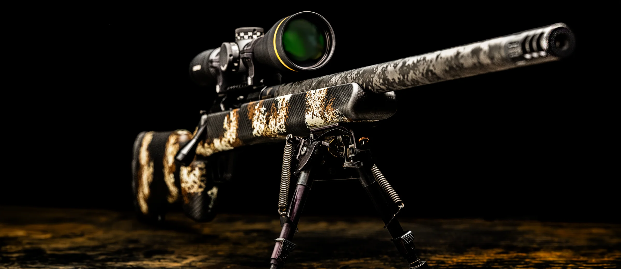 Watchtower Defense Stratis bolt-action rifle in Westrider Camo, hand-painted carbon fiber stock, with scope and bipod